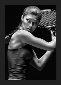Black and white portrait of female tennis player in action-1