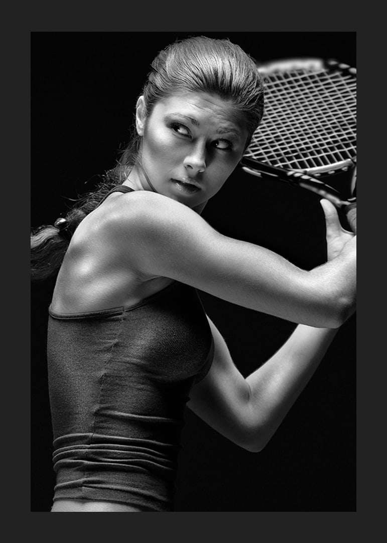 Black and white portrait of female tennis player in action-12