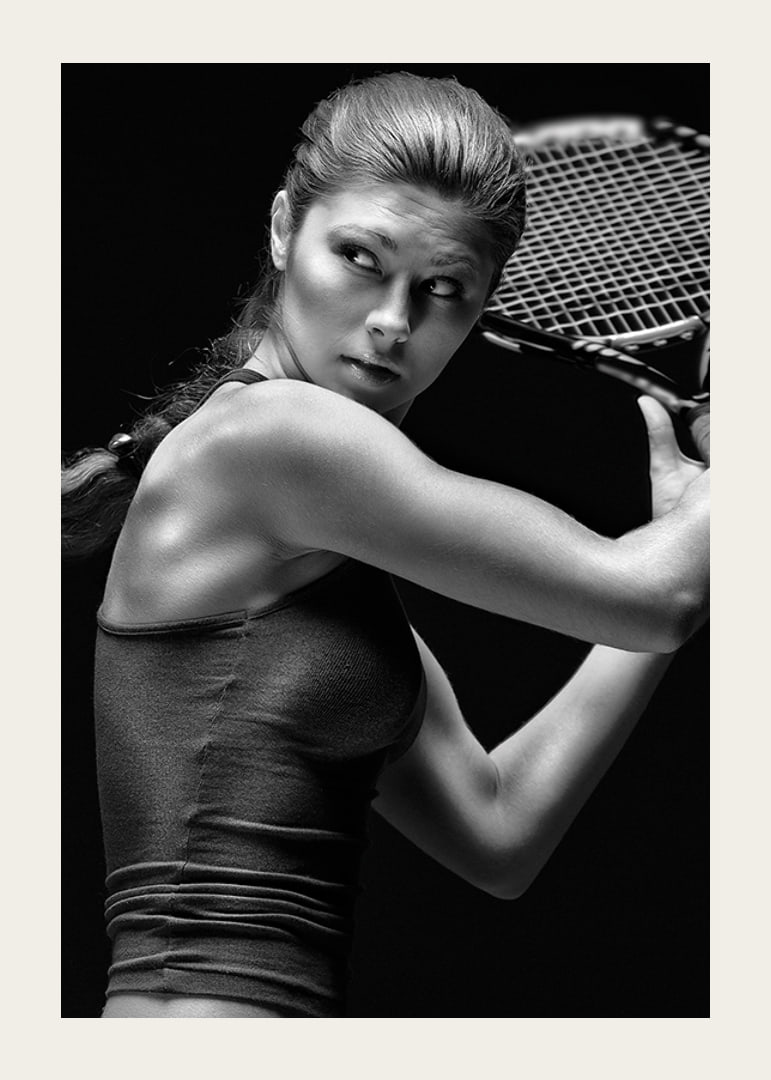 Black and white portrait of female tennis player in action-12