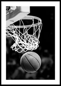 Black and white close-up of basketball going through basket-2