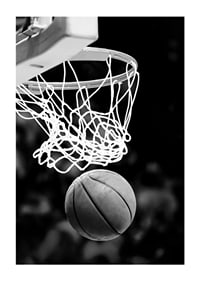 Black and white close-up of basketball going through basket-3