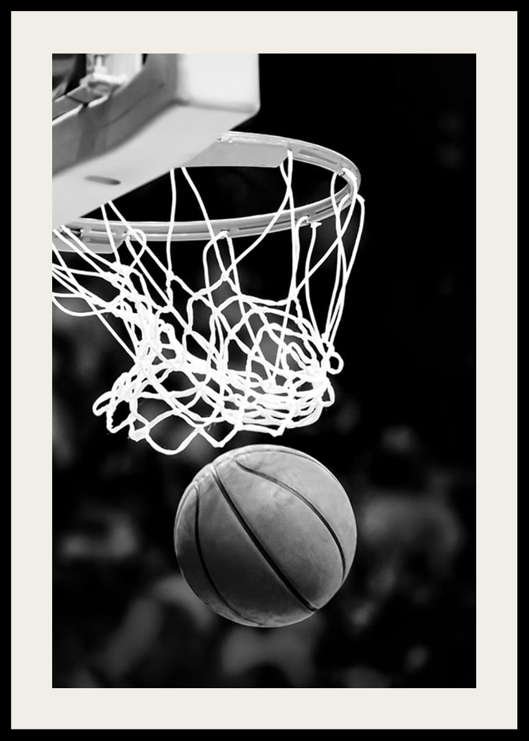 Black and white close-up of basketball going through basket-12