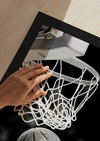 Black and white close-up of basketball going through basket-9
