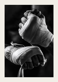 Black and white close-up of hands tied with boxing bandages-5