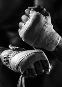 Black and white close-up of hands tied with boxing bandages-7