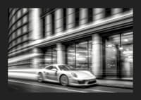Black and white photograph of Porsche 911 in motion in front of city hall-5