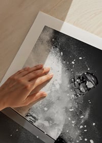 Black and white action shot of snowboarder in the middle of a jump-9