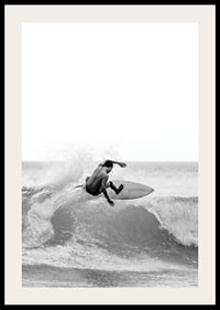 Black and white surfer caught in the middle of a wave jump-2