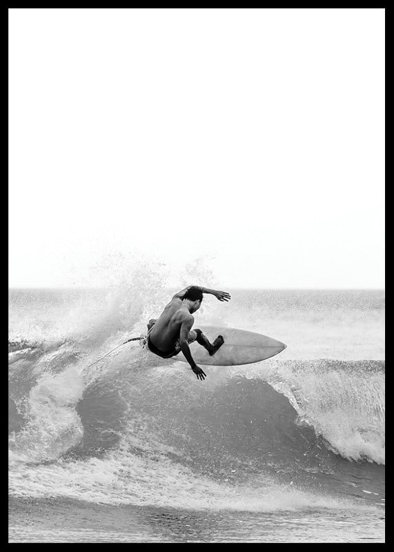 Black and white surfer caught in the middle of a wave jump-12
