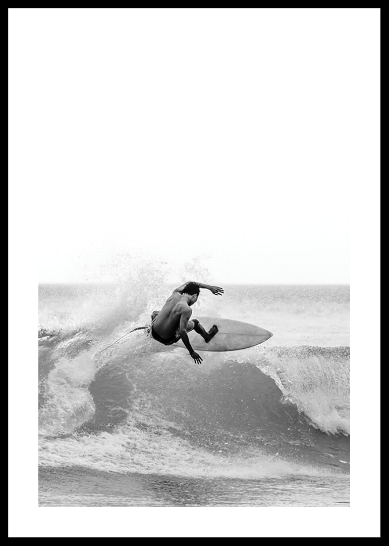 Black and white surfer caught in the middle of a wave jump-12