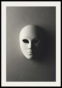 White theater mask with smooth features against gray wall in shadowy light-2