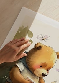 Illustrated bear reading a book among butterflies, soft colors-9