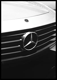 Black and white close-up of Mercedes grille with emblem in focus-6