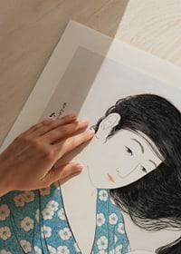 Japanese woman in blue kimono combing long dark hair, Goyō Hashiguchi-3
