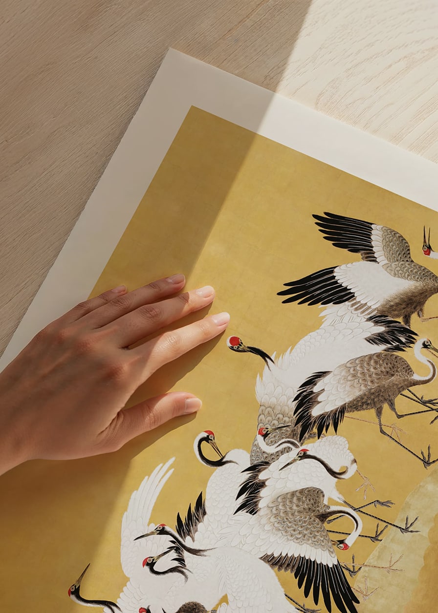 Classical painting of cranes in a group against a golden yellow background-12