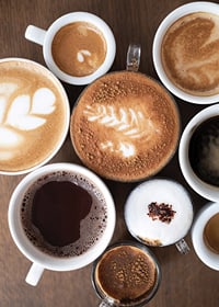 Photograph of different coffee cups with varying brews-7