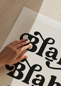 Graphic text with the words Blah Blah Blah in black against beige-9