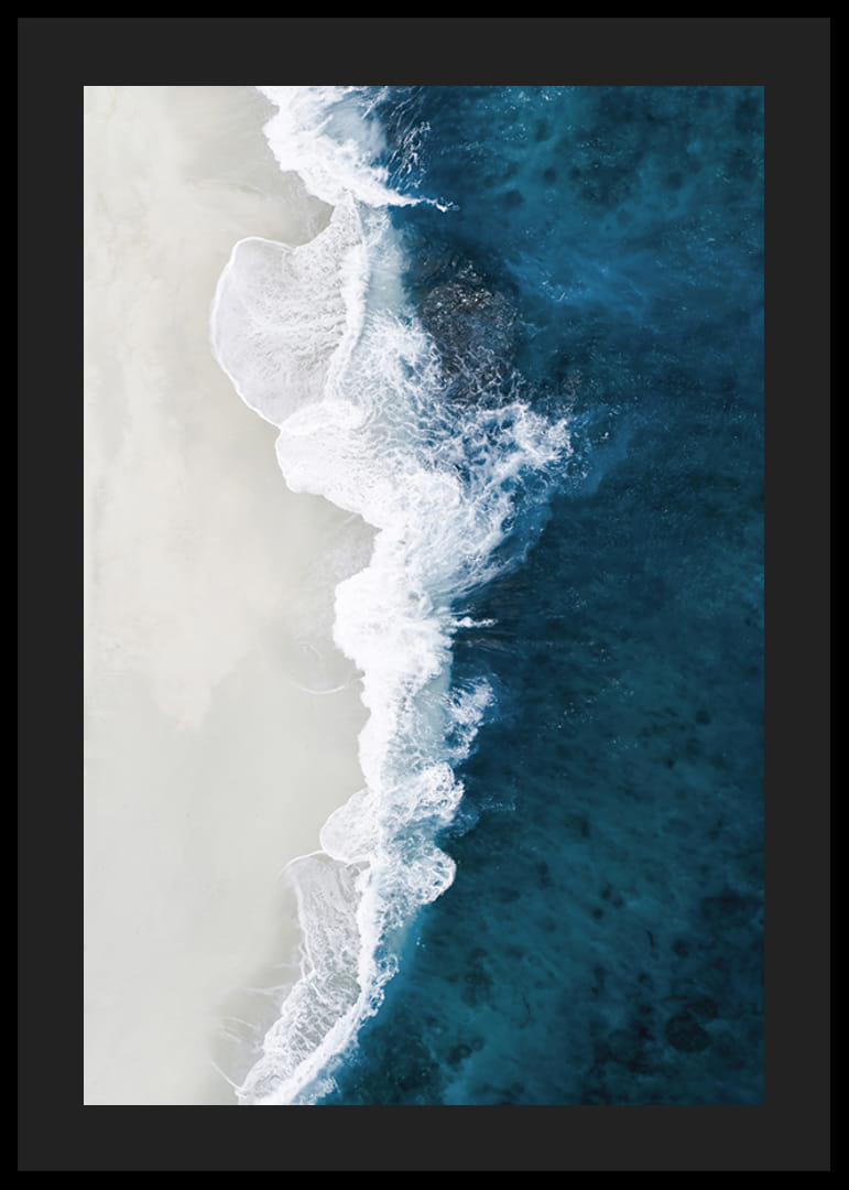 Ocean waves crashing against bright sandy beach, aerial view in blue and white-12