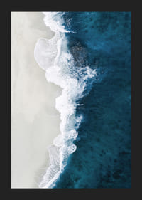 Ocean waves crashing against bright sandy beach, aerial view in blue and white-5