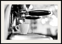 Black and white photo of espresso machine with cup during brewing-2