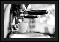 Black and white photo of espresso machine with cup during brewing-4