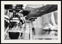 Black and white photo of hand brewing espresso in cup-2