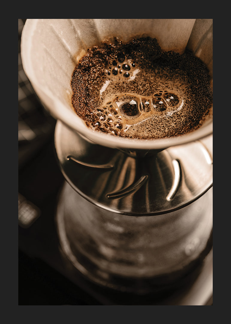 Close-up of coffee maker with filter in brown shades-12