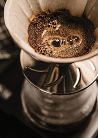Close-up of coffee maker with filter in brown shades-7