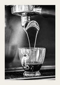 Black and white photo of espresso machine brewing coffee in cup-3