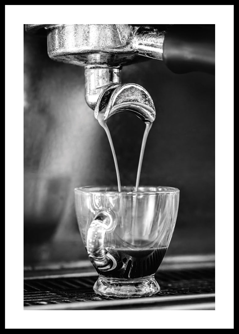 Black and white photo of espresso machine brewing coffee in cup-12