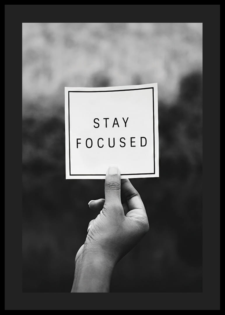 Black and white photo of hand holding note with text-12