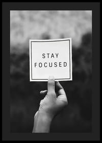 Black and white photo of hand holding note with text-4