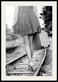 Black and white photograph of girl with suitcase on railway tracks-2