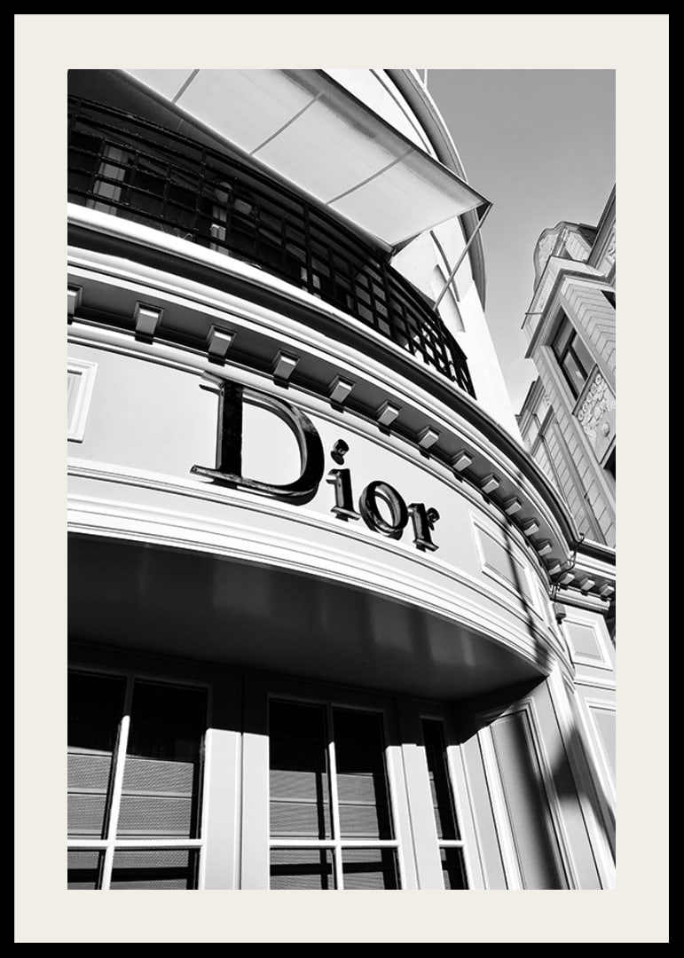 Black and white close-up of Dior store facade with graphic lines-12