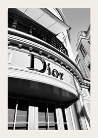 Black and white close-up of Dior store facade with graphic lines-3