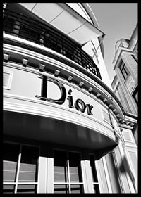 Black and white close-up of Dior store facade with graphic lines-6
