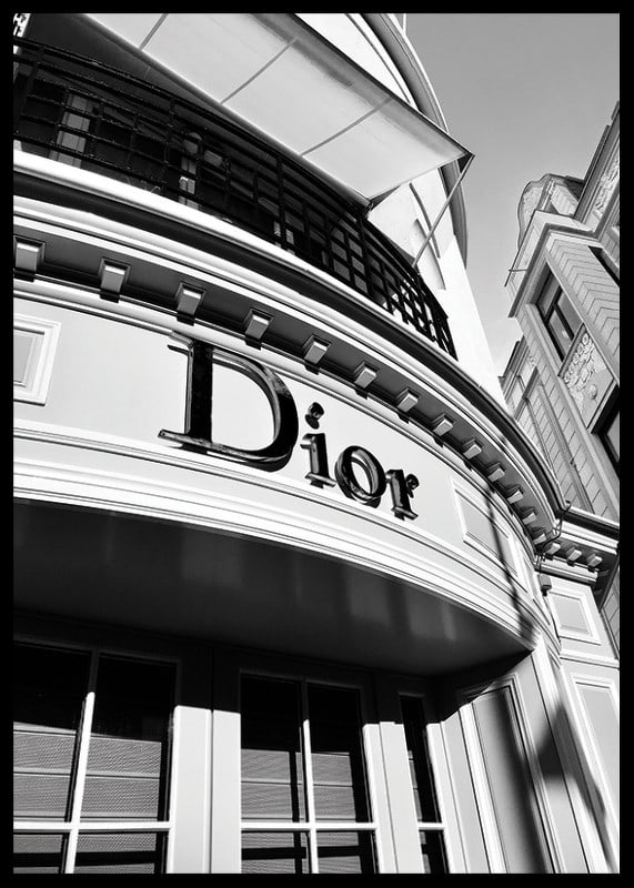 Black and white close-up of Dior store facade with graphic lines-12