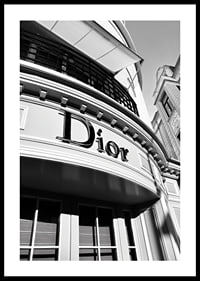 Black and white close-up of Dior store facade with graphic lines-0