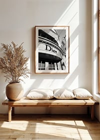 Black and white close-up of Dior store facade with graphic lines-8