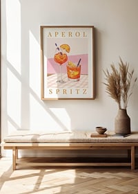 Watercolor of two Aperol Spritz on checkered cloth with orange slices-2