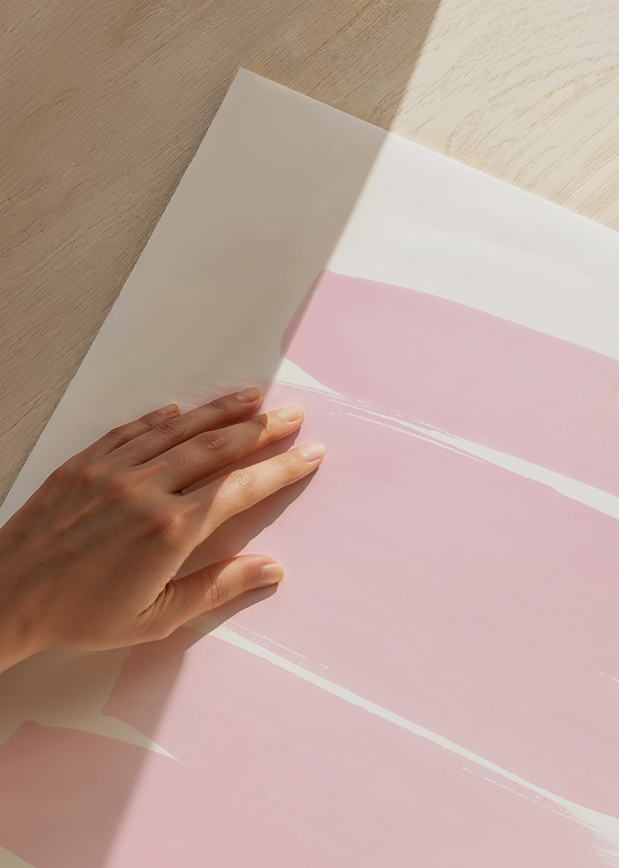 Abstract brush strokes in light pink against white background-12