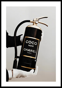 Stylized fire extinguisher in black and gold with Chanel label-0
