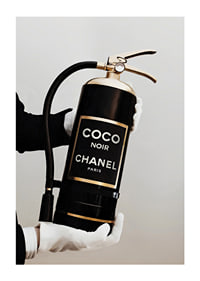 Stylized fire extinguisher in black and gold with Chanel label-1