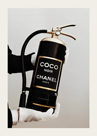 Stylized fire extinguisher in black and gold with Chanel label-3
