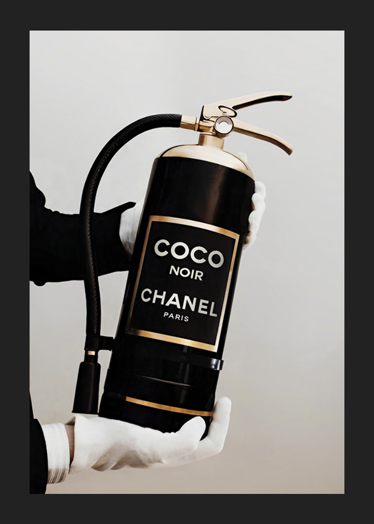 Stylized fire extinguisher in black and gold with Chanel label-12