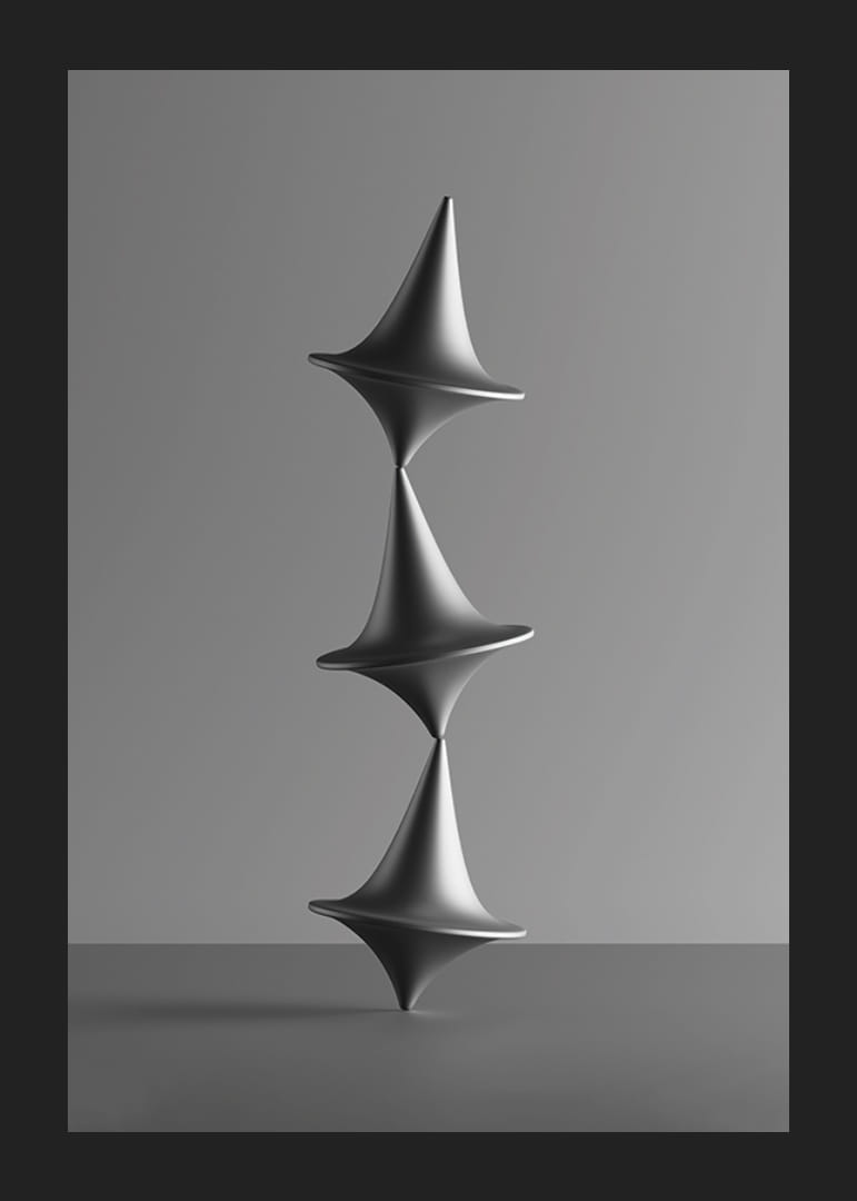 Čiernobiela fotografia troch naukladaných káčov na sivom pozadí-12