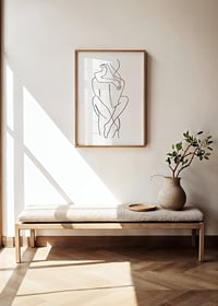 Minimalist line art of seated couple in embrace, black and white-2