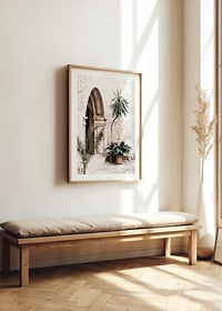 Photograph of stone arches and potted plants in a bright Mediterranean setting-8