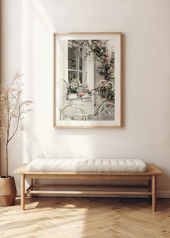Photograph of white bicycle with flower basket in front of flower-adorned facade-12