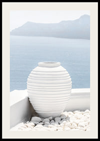 Photograph of white ceramic vase against sea and mountains on Santorini-2